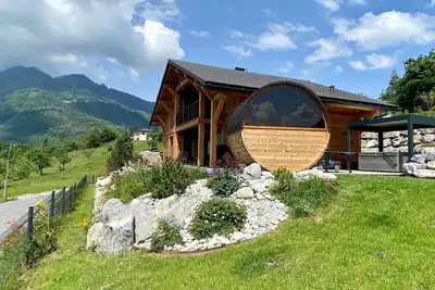 Image de Chalet avec vue sur les montagnes, jacuzzi et sauna