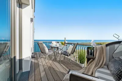 Image de Ostseerauschen - 3rd floor, 1st row by the water, balcony, barbecue, fireplace