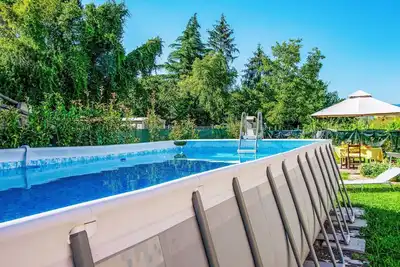 Image de Agréable appartement avec piscine privée, climatisation, Wifi, Tv, patio, animaux admis et parking