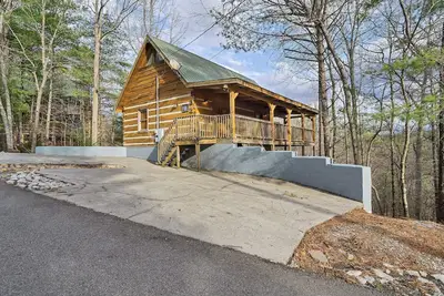 Image de Nice log cabin with hot-tub and pool table, wi-fi and gas fire-place