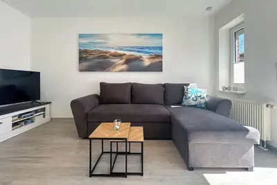 Image de Bright vacation apartment Duhner Deichmöwe with private garden in Duhnen