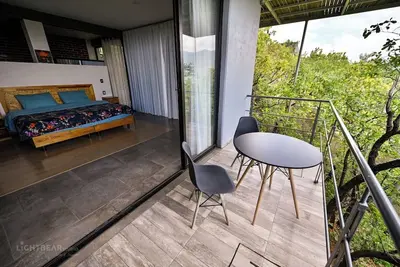 Image de Suite Arbolada: sleep in the forrest with direct access to the pool
