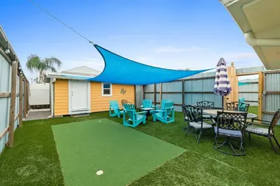 Image de Charming, Dog-Friendly Duplex with Game Room, Putting Green, Outdoor Oasis, and Just Steps to the Beach!