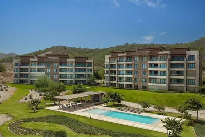 Stunning Apt. with Ocoa's Bay View, 2 bedrooms, Beach Club.
