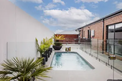 Image de Coasty- Sleeps 8, Heated Pool, Cinema Room, Aircon, Parking
