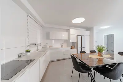Beach vicinity, shopping G-level, parking. Near playground. Shabbat elevator\n