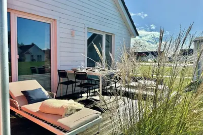 Image de Weidefelderstrandhaus - terrace, fireplace, sauna, shower, washer-dryer, parking space