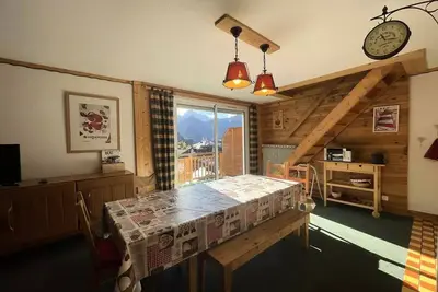 Image de Duplex chaleureux en centre station avec vue sur les pistes
