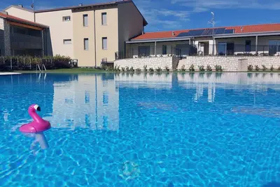 Image de Appartement 'New Casa Augusto' avec piscine partagée, Wi-Fi et climatisation