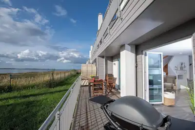 Image de Silbermöwe - roof terrace with panoramic view, 1st row on the water, fireplace, sauna