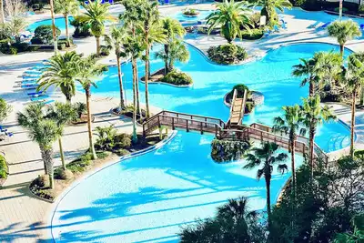 Image de 1509 Gorgeous 2 Bdrm ~ Lagoon Pool ~ Poolside Bar - Hot tub ~ Book July 12th