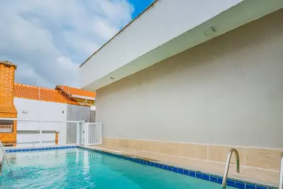 Image de Linda casa com piscina em condomínio em Itanhaém
