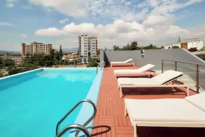 Image de Chic 1-bedroom apartment with Ac, Swimming pool, fitness room in wonderful Kigali