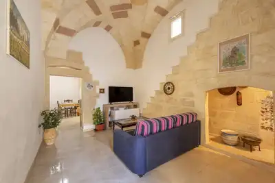 Image de Appartement 'La Corte Della Zia Santa' avec terrasse privée, Wi-Fi et climatisation