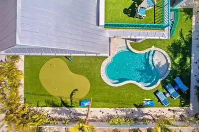 Image de Coral Reef: 50ft to Beach, Games Galore, Rooftop Deck, Pool, Spa by Anna Maria Life Vacation Rentals