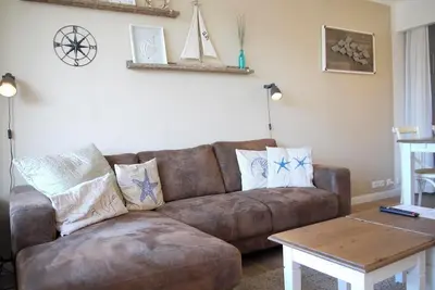 Image de Familienfreundliche Ferienwohnung Direkt am Strand mit Beheiztem AuĂźenpool