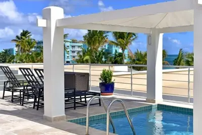 Charming upscale 3-bedroom condo with private pool in brilliant Dawn Beach.