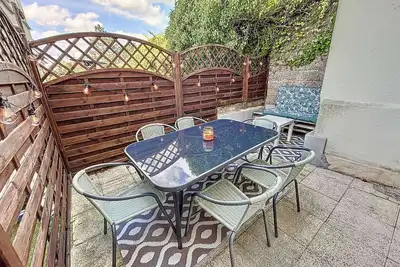 Image de Appartement Rdc près de la plage avec terrasse et Wi-Fi