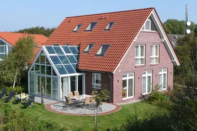Image de Appartement 'Haus Admiral - Fewo Nordlicht' avec terrasse privée, jardin privé et Wi-Fi