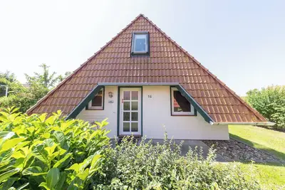 Image de Vacation home Hans Albers 16, picturesque and on the dike.