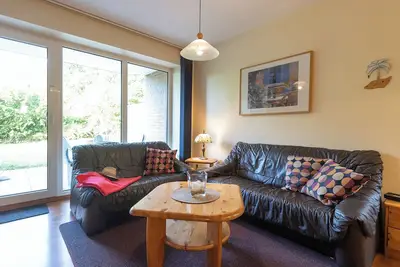 Image de Vacation apartment Deichläufer. Surrounded by greenery and with a terrace.