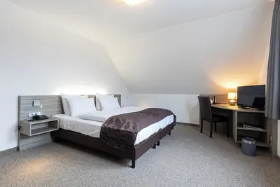 Image de Double room 114. Airy and with sofa.