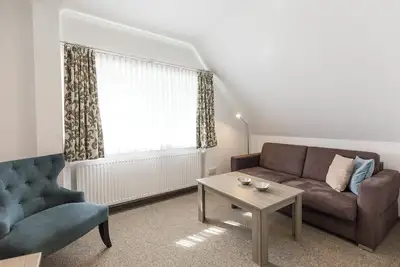 Image de Studio 201. With sofa and style.