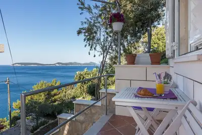 Image de Apartments Lovro - Duplex One Bedroom Apartment with Terrace and Partial Sea View (1)