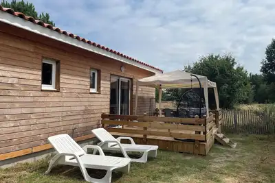 Image de Chalet moderne à 100 m des pistes cyclables, idéal famille ou couple. Animaux ok