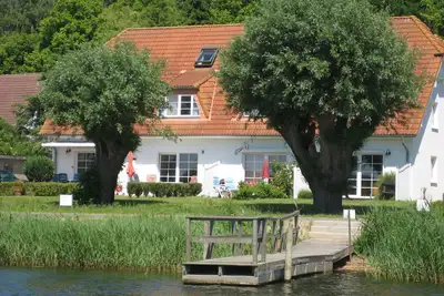 Image de House with lake view, free use of sauna and swimming pool - Fährhaus Sellin Nr. 12