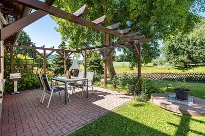 Image de Appartement 'Ferienwohnung Am Augusttal' avec vue sur les montagnes, terrasse privée et Wi-Fi