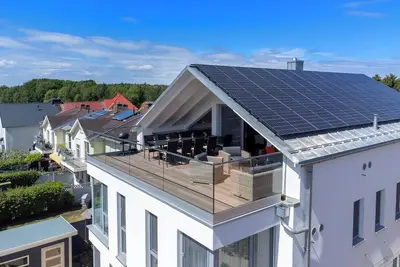 Image de Penthouse 250m from the Baltic Sea beach with sauna and fireplace with 4 bedrooms