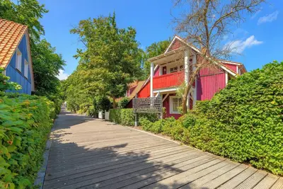 Image de Vacation apartment with private sauna and fireplace, right on the beach.