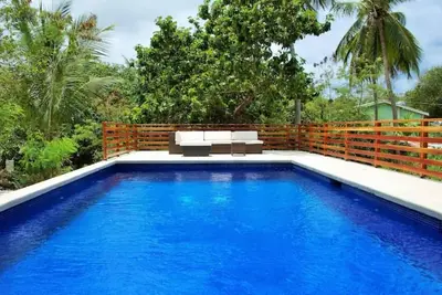 Image de Large modern villa with pool on West Coast near beach & restaurants w\/ parking.