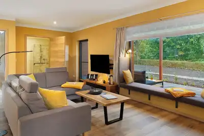 Image de Maison de vacances 'Ferienhaus Milchstraße Am See' avec vue sur le lac, terrasse privée et Wi-Fi