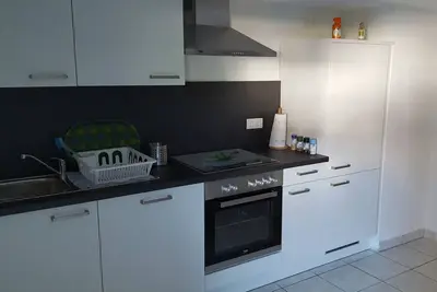 Image de Appartement \"Wohnung Erdgeschoss\" avec terrasse privée et Wi-Fi