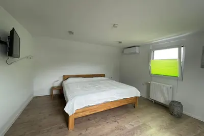 Image de Appartement 'Ferienwohnung Obergeschoss' avec jardin privé, Wi-Fi et climatisation