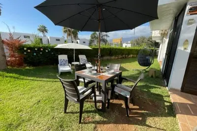Image de Apartamerica Garden Apartment, 150 Metres From The