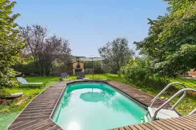 Image de Merveilleuse maison de vacances avec bain à remous, piscine privée, climatisation, Wifi, Tv, patio