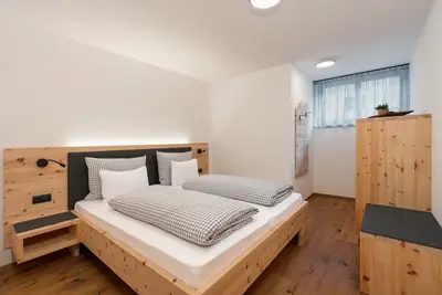 Image de Appartement \"Huberhof Edelweiss\" avec vue sur les montagnes, terrasse privée et Wi-Fi