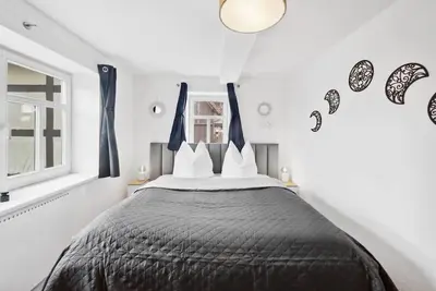 Image de Appartement 'Apartments Am Hainich - Elsbeere' avec terrasse partagée, jardin privé et Wi-Fi