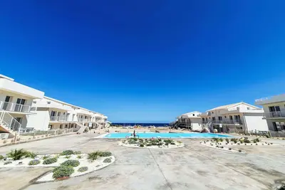 Image de Bel appartement pour 4 personnes avec Wifi, piscine, climatisation, Tv, terrasse et parking