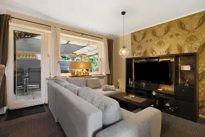 Image de Appartement \"Kompass Oase\" avec terrasse privée, jardin privé et Wi-Fi