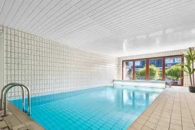 Image de Cozy vacation apartment on the North Sea with indoor swimming pool and balcony
