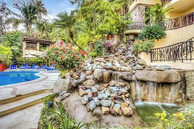 Luxurious 5-bedroom villa with private pool and chef near the beach