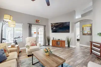 Modern home with large yard, mountain views, & convenient location