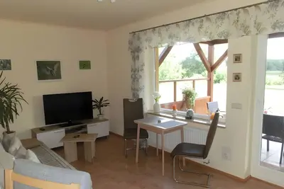 Image de Appartement 'Federower Hofsee Seeadler' avec vue sur le lac, terrasse privée et Wi-Fi
