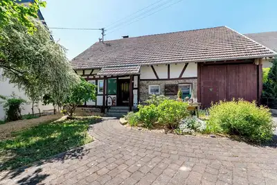 Image de Maison de vacances 'Ferienhäuschen Kleine Auszeit' avec terrasse privée, jardin privé et Wi-Fi