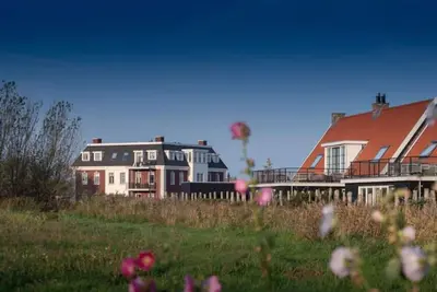Image de Design Apartment in Zeeland With its own Wellness