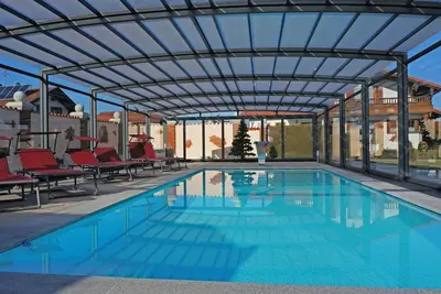 Image de Alluring Holiday Home in Ubersee With Whirlpool